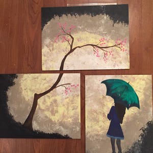 Menina guarda-chuva pintando em madeira