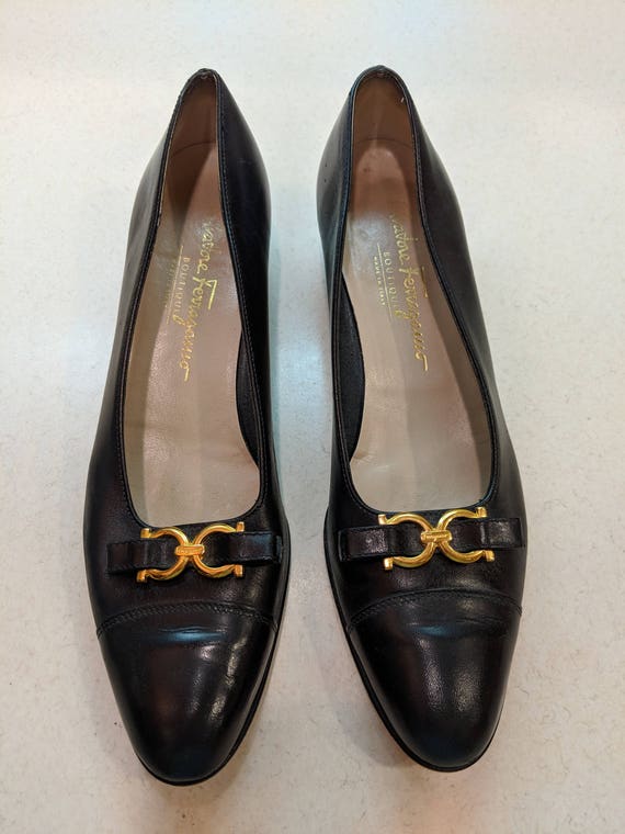 black and gold designer shoes