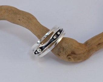 Hand Forged Sterling Silver Ring Set: Anticlastic Oxidized Stacking Rings