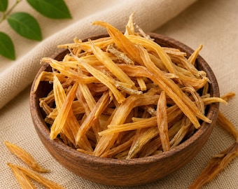May include: A dark brown wooden bowl filled with a heap of dried, golden-yellow daylily buds. The long, slender, and slightly wrinkled plant stems are piled high within the circular container, showcasing their natural, fibrous, and elongated texture.