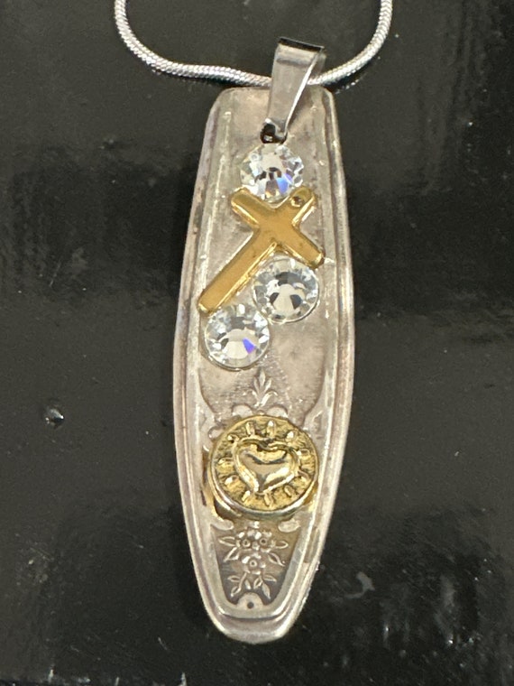 Cross and clear crystals with gold heart spoon necklace