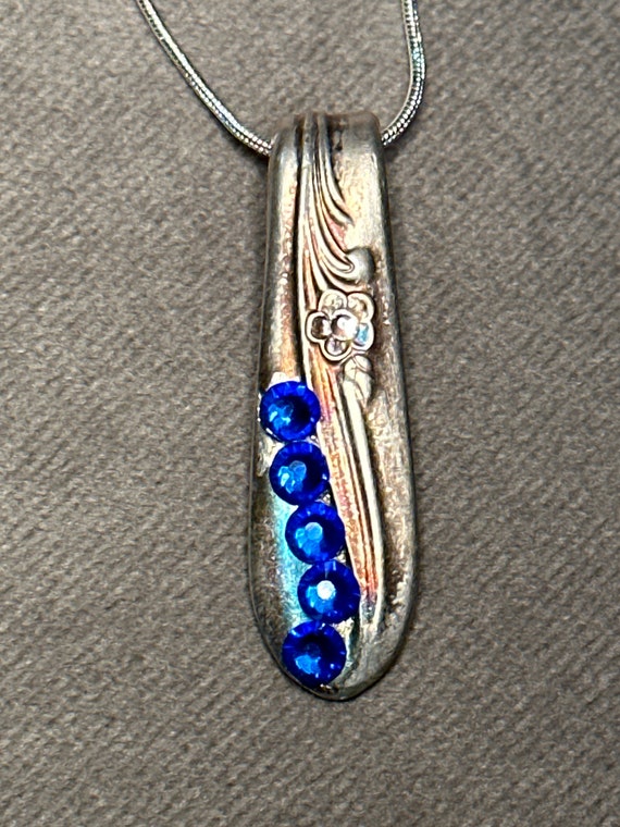 Blue and clear crystals spoon necklace