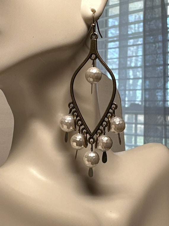 Faceted pearls and bronze earrings