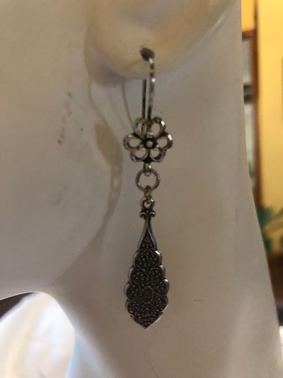 Handmade silver colored filigree drop earrings on nickel free ear wires