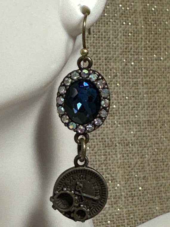 Handmade sapphire blue glass oval crystal surrounded by mystic crystals with bronze clock gear dangle earrings