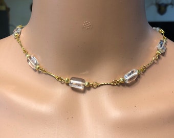 Handmade clear glass and golden metal beaded necklace