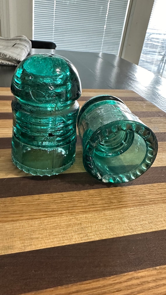 Antique green Brookfield glass insulator