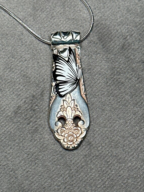 Black and white butterfly spoon necklace