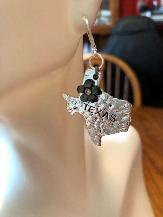 Handmade hammered Texas earrings with siver and black flower