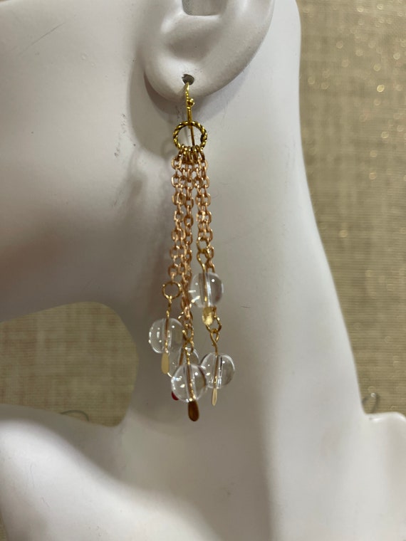 Handmade golden dangle earrings