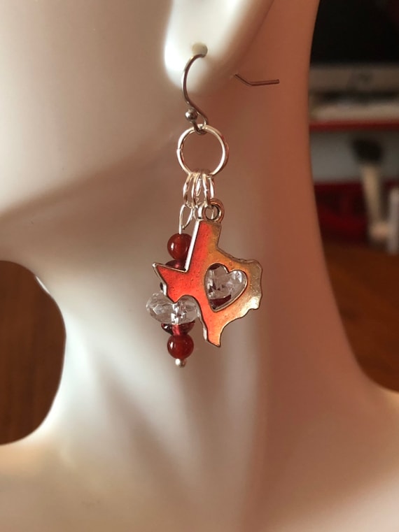 Handmade Texas dangle earrings with red, maroon and clear crystal dangles