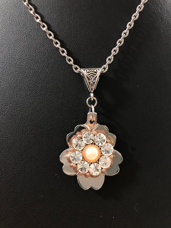 Handmade metal flower necklace with clear crystals and pearl center