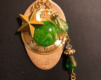 Recycled golden painted spoon necklace with watch face, green resin and glass stones with star and stone dangle