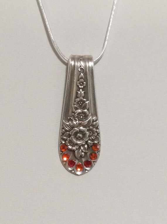 Handmade Jubilee spoon handle pendant with red orange Swarovski crystals