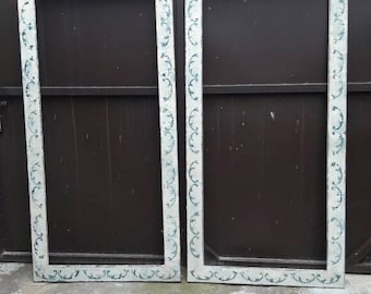 Pair of hand-painted frames with aged mirror.