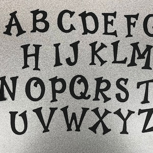 Papier découpé pour lettres de différentes tailles, pouces à pieds