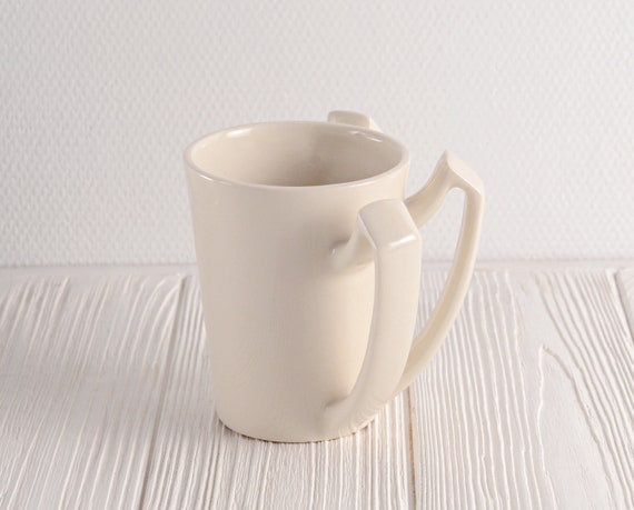 Porcelain coffee mugs with matte white finish · Handmade Ceramic