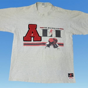 Vintage 1990s Nutmeg Mills Muhammad Ali Tshirt Single Stitch Crewneck Flocked Letter Size Large Made in USA Boxing