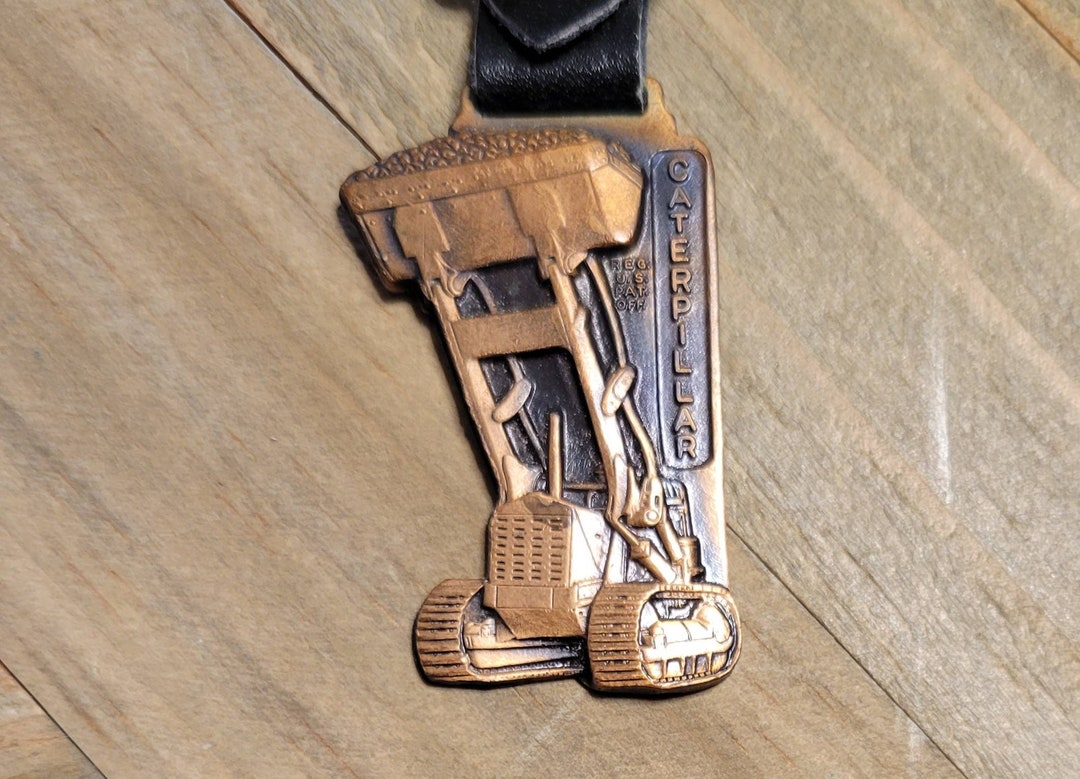 Vintage Caterpillar Pocket Watch Fob Leavens Mfg Brass Toned Metal