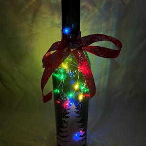 Wine Bottles,Christmas themed things, Christmas bottles,Personalized wine bottles, center pieces, wine bottles, decals for wine bottles,gift