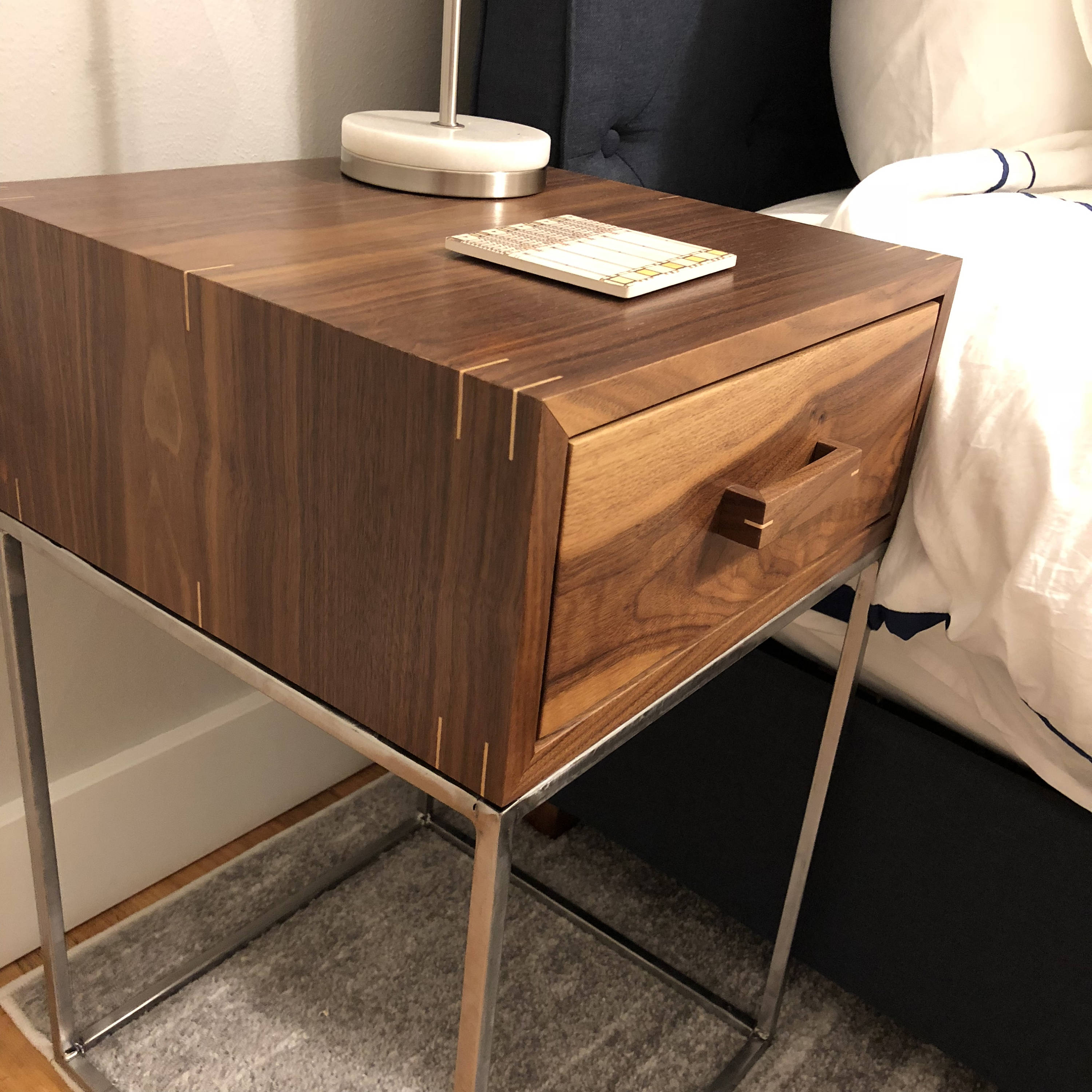 Nightstand with outlet metal legs