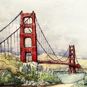 May include: A watercolor painting of the Golden Gate Bridge in San Francisco. The bridge is painted in red with a blue sky and clouds in the background. The bridge is surrounded by green trees and bushes.