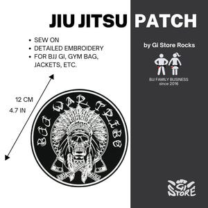 May include: Circular black and white embroidered patch featuring a skull in a Native American headdress. The patch is 12 cm (4.7 in) in diameter and reads "Bad War Tribe". Suitable for BJJ Gi, gym bags, and jackets.