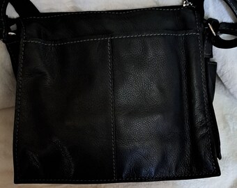 Vintage Wilsons Leather High Quality Soft Black Genuine Leather  Handbag with white stitching and  adjustable strap. Like New, great price