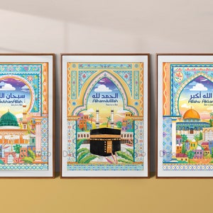 May include: Three colorful framed prints with Islamic calligraphy and illustrations of mosques. The prints feature the phrases "SubhanAllah", "Alhamdulillah", and "Allahu Akbar".