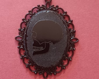 Victorian style skull stained glass necklace