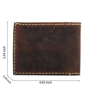 May include: A brown leather wallet with a stitched edge. The wallet measures 4.92 inches wide and 3.34 inches tall.
