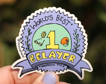 May include: A purple and green sticker with a blue ribbon and the text "World's Best #1 Belayer Unofficial Title" and the text "@onetimelliace" at the bottom.