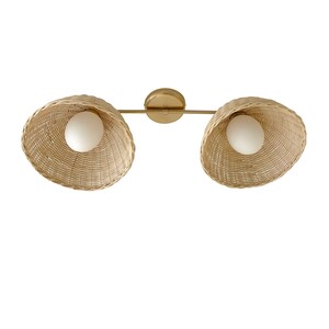 May include: A gold metal light fixture with two woven wicker shades and white globe light bulbs.