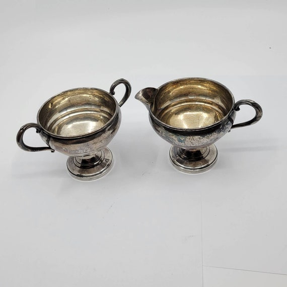 Antique silver creamer and sugar clearance
