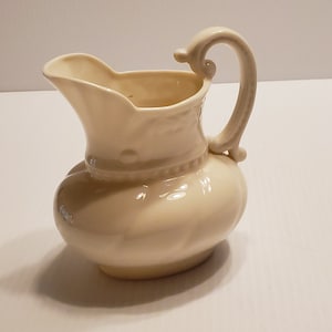 Lenox small off-white porcelain pitcher.