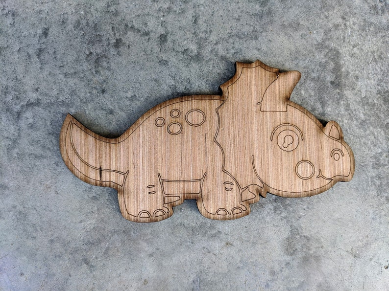 painted wood dinosaur cut outs