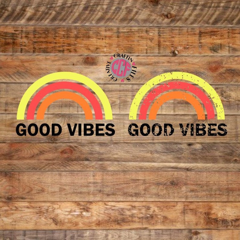 May include: Two digital downloads of a rainbow graphic with the text "GOOD VIBES" in black. The rainbows are in shades of yellow, orange, and red. The background is a woodgrain pattern.