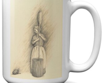 Kubek do kawy, Indianka mieląca kukurydzę, „Przyjrzyj się bliżej”, żółw, obraz naniesiony sublimacją na ceramicznym kubku do kawy.