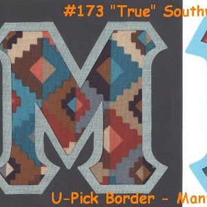May include: Two fabric letters, M and K, with a Southwestern pattern in shades of brown, blue, and red. The letters have a white border and are outlined in blue. The text "#173 "True" Southwest" is above the letters. The text "U-Pick Border - Many Colors Available" is below the letters.