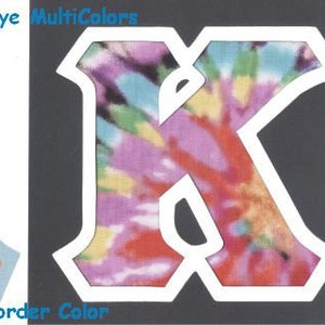 May include: Two iron-on letters, A and K, in a white outline with a tie-dye pattern in shades of pink, blue, yellow, and green. The text #1555 Sunburst Tie Dye MultiColors is at the top of the image. The text UPick Border Color is at the bottom of the image.