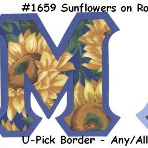 May include: Two large letters, "M" and "A", are cut out of blue fabric and backed with a sunflower print fabric. The text "#1659 Sunflowers on Royal Blue" is at the top of the image. The text "U-Pick Border - Any/All Colors Available" is at the bottom of the image.