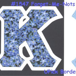 May include: Two fabric letters, K and B, with a forget-me-not flower pattern. The letter K has a white border, and the letter B has a light blue dotted border. The text "#1547 Forget-Me-Nots Shades of Blue" is at the top of the image. The text "Upick Border Color" is at the bottom of the image.
