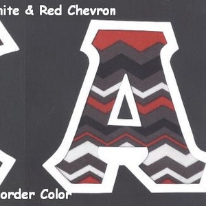 May include: Two large white letters, "K" and "A", with a black and white chevron pattern with red accents. The letters are outlined in white and have a black background. The text "#725 Blk White & Red Chevron" is above the letters. The text "UPick Border Color" is below the letters.