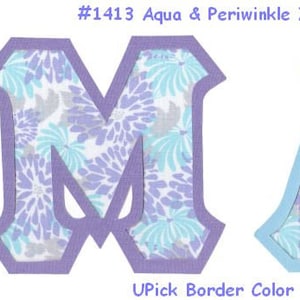 May include: Two fabric letters, M and A, with a floral pattern in shades of blue and purple. The letters have a purple and blue border, respectively. The text #1413 Aqua & Periwinkle Zinnias is at the top of the image. The text "UPick Border Color" is at the bottom of the image.