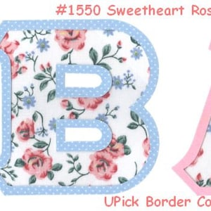 May include: Two fabric letters, "B" and "A", with a floral pattern and a light blue and pink border. The letters are cut out and have a white background. The text "#1550 Sweetheart Roses" is at the top of the image. The text "UPick Border Color" is at the bottom of the image.