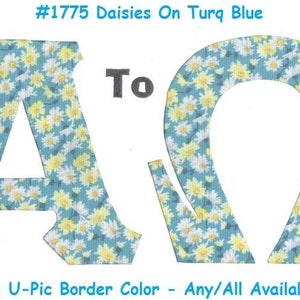 May include: Two fabric letters, A and O, in a turquoise blue color with a white and yellow daisy pattern. The letters are cut out and have a white background. The text #1775 Daisies On Turq Blue and To are also visible in the image. The text U-Pic Border Color - Any/All Available is also visible in the image.