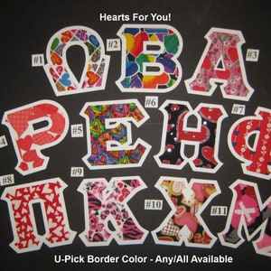 Puede incluir: Un conjunto de 11 letras de tela con un patrón de corazón. Las letras son O, B, A, P, E, H, F, I, K, X y M. Las letras son blancas con un patrón de corazón rojo, rosa y negro. Las letras están numeradas del 1 al 11. El texto "Hearts For You!" y "U-Pick Border Color - Any/All Available" están en la parte superior e inferior de la imagen.