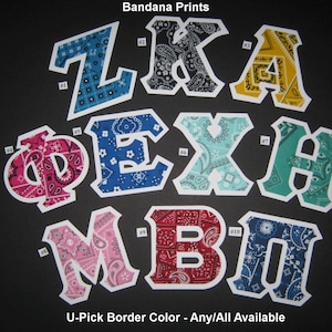 May include: Bandana Prints: A set of nine letters, Z, K, A, Φ, E, X, H, M, B, and I, each made of a different bandana print fabric. The letters are outlined in white and have a number next to them.