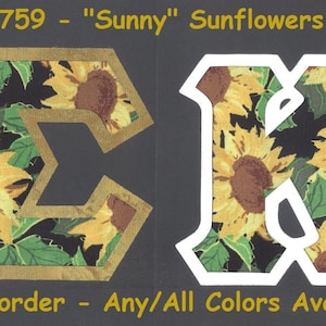 May include: Two fabric letters, "E" and "K", with a sunflower pattern on a black background. The letters have a gold and white border, respectively. The text "#1759 - "Sunny" Sunflowers" and "UPic Border - Any/All Colors Available" is also visible.