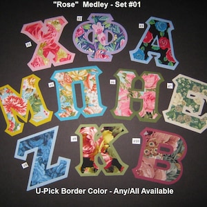 May include: A set of ten fabric letters with a floral pattern, each letter has a different color border. The letters spell out "XOPHINEZB". The letters are labeled with numbers 1 through 10. The text "Rose" Medley - Set #01 and "U-Pick Border Color - Any/All Available" is also visible.